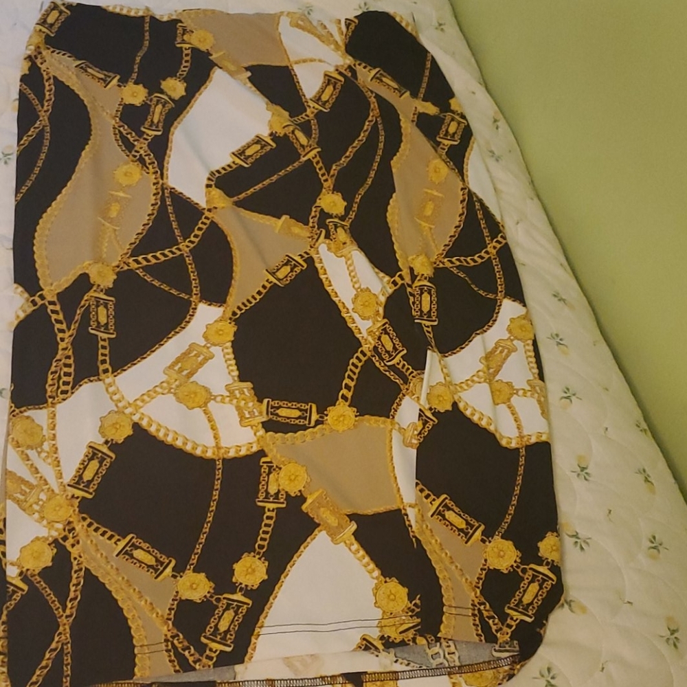 Never warn Ashley Stewart skirt with chain print